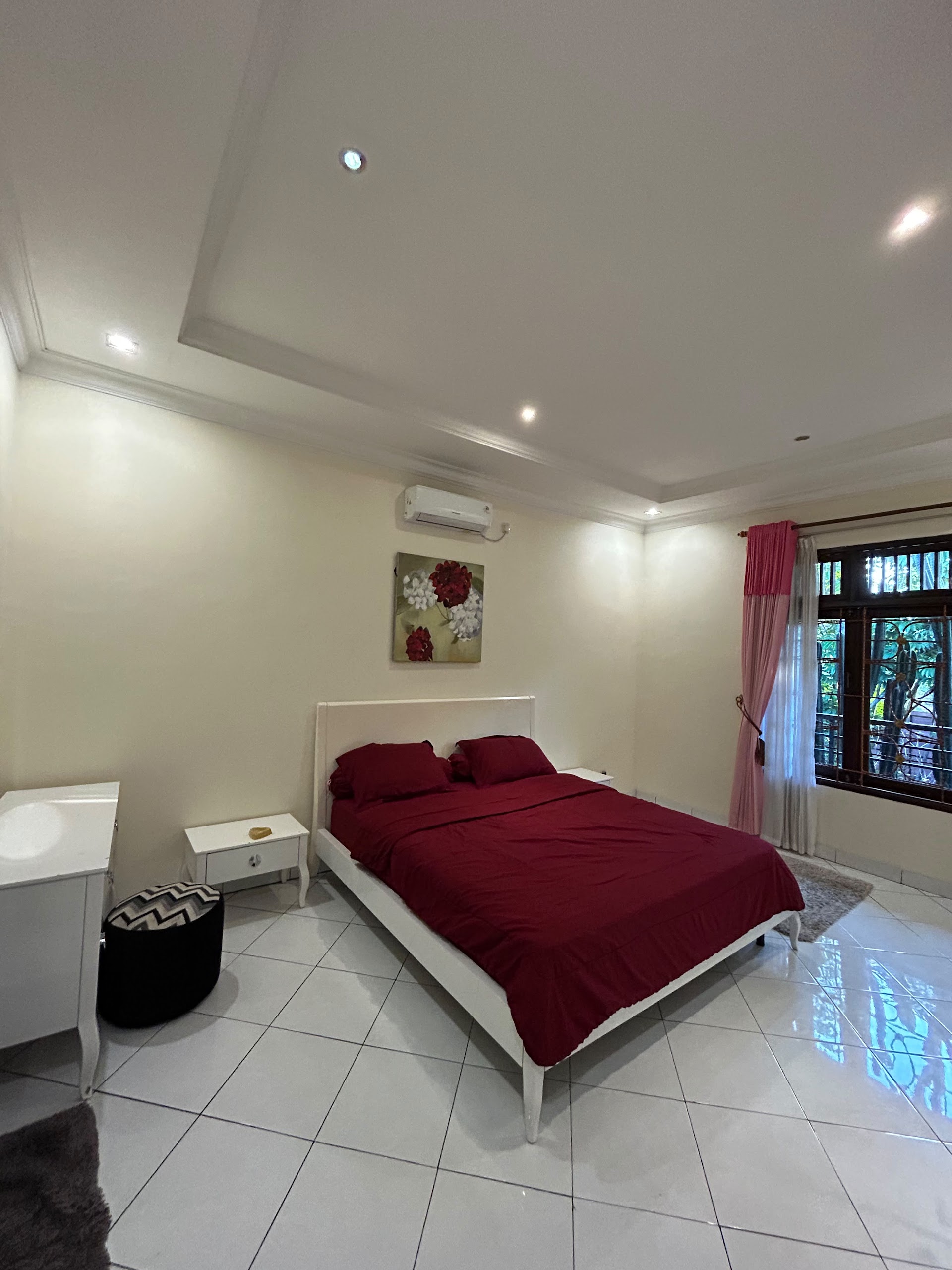 Bedroom with red bedding and curtains, Al Andalus 2 Puncak