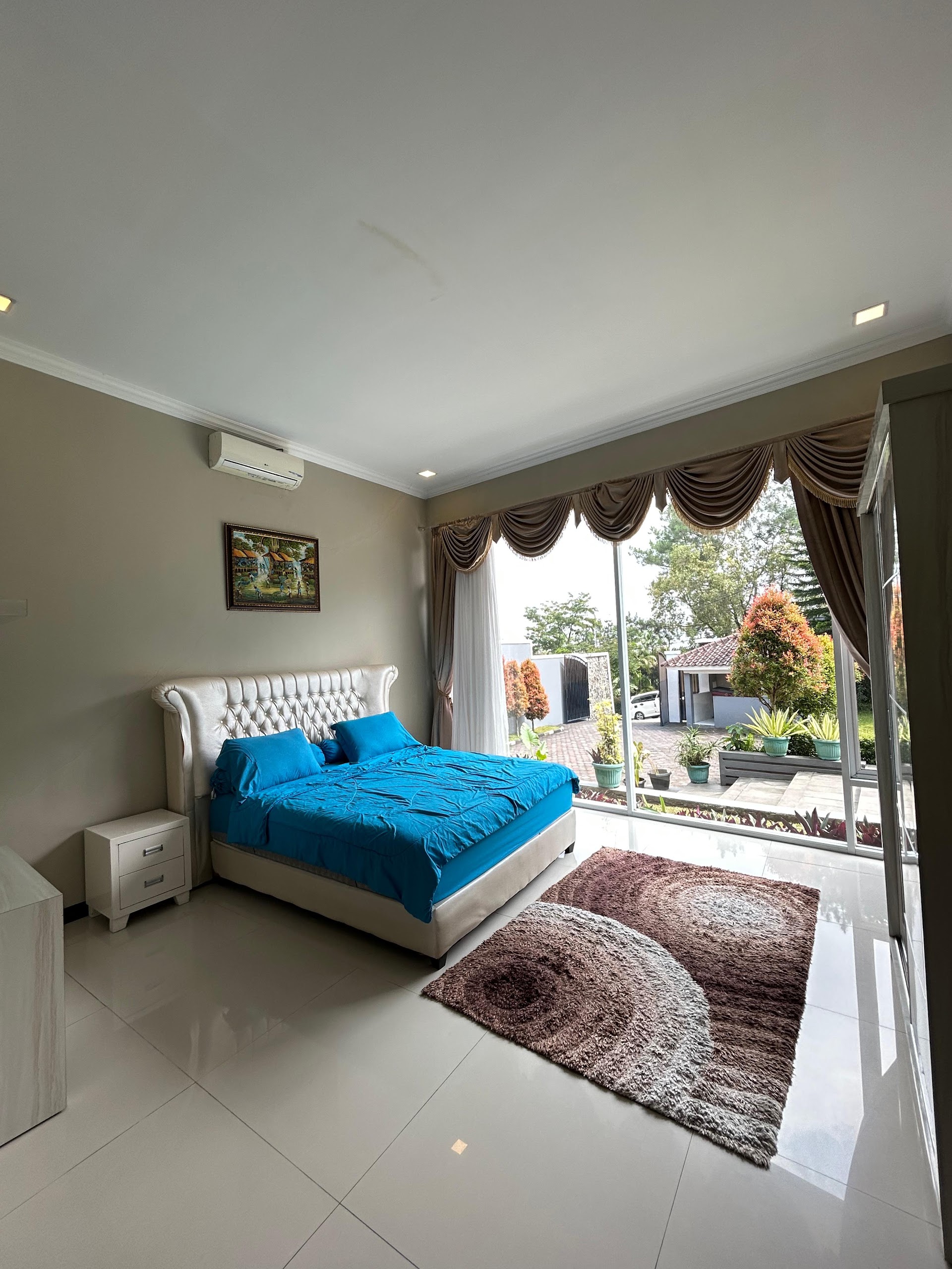 Bedroom with curtained window onto the garden, Al Andalus 3 Puncak