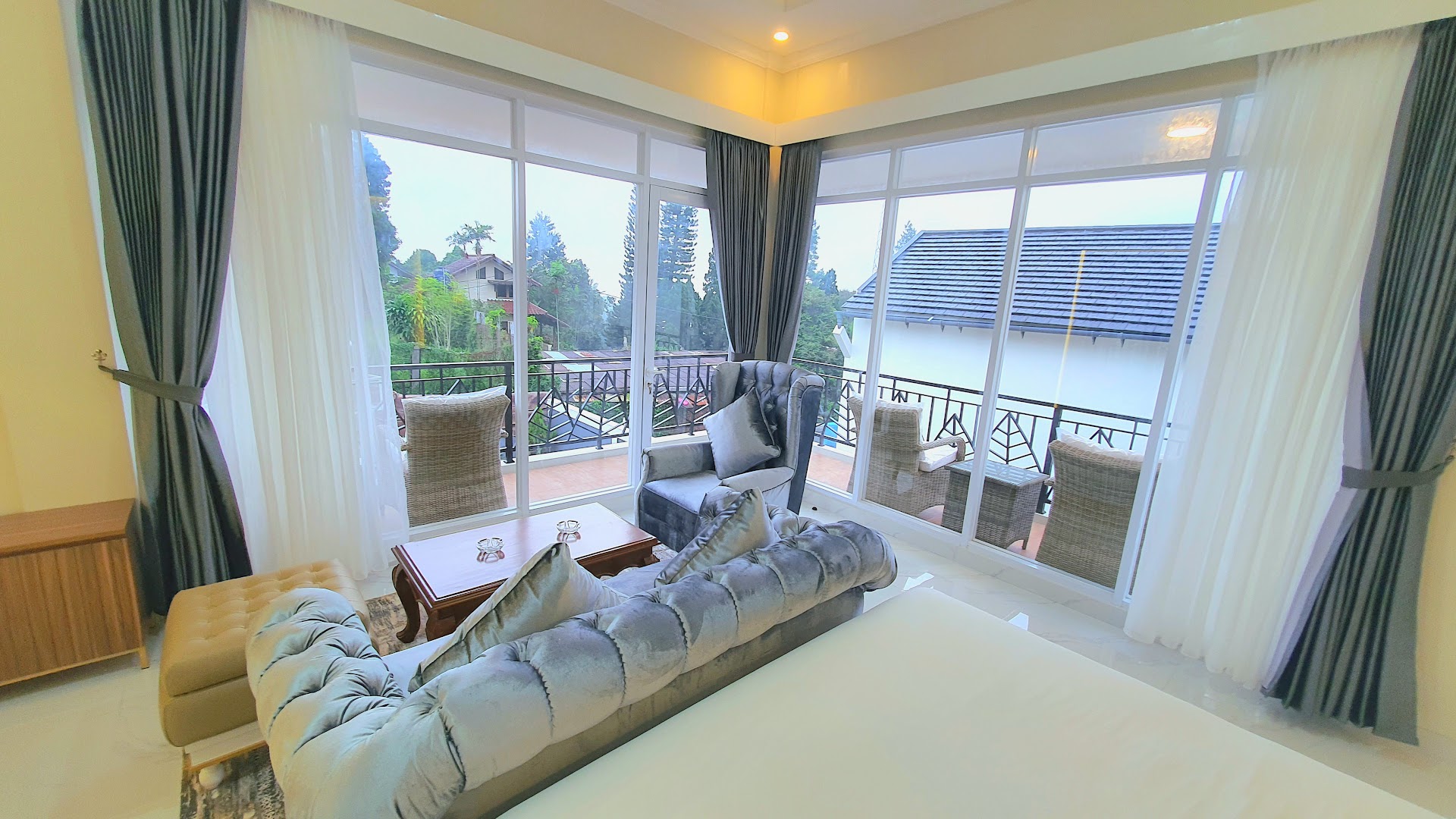 Bedroom with grey headboard and sofa, Al Andalus Royal Puncak